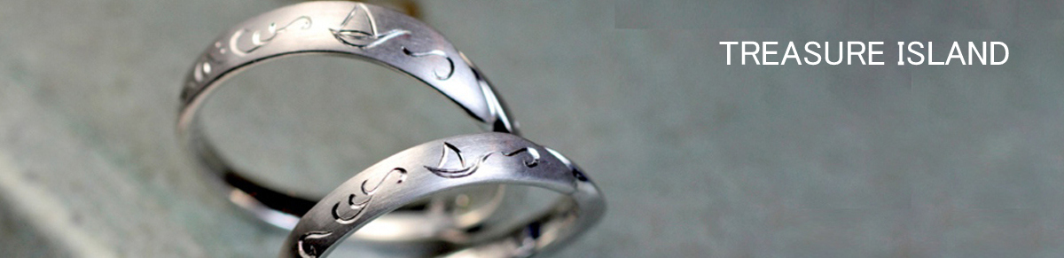 宝島・ヨットと海の柄が入ったオーダーメイドの結婚指輪
