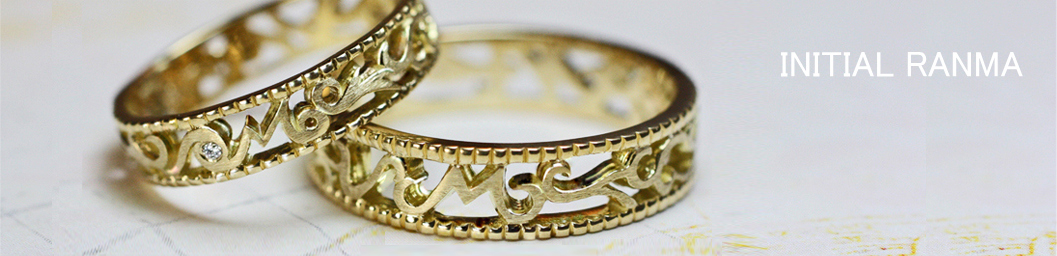 イニシャルＭを欄間の透かし模様でデザインした結婚指輪オーダー作品