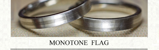 白とグレーのモノトーンでデザインされたオーダーメイド結婚指輪の画像