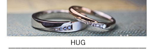 指をハグするブラックダイヤとピンクゴールドの結婚指輪オーダー作品の画像