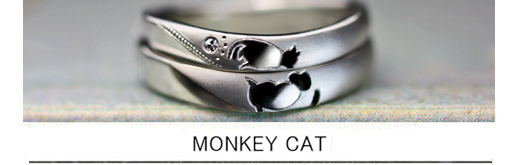 結婚指輪を重ねるとネコとお猿がチューしてるデザインのオーダー作品の画像