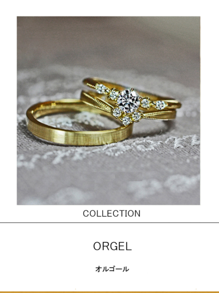 オルゴールからイメージデザインされたゴールドの婚約指輪と結婚指輪のセットリング