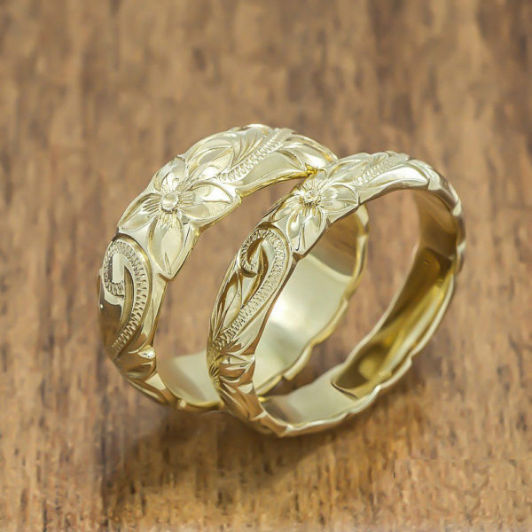 ゴールドのハワイアンジュエリーデザインの7結婚指輪