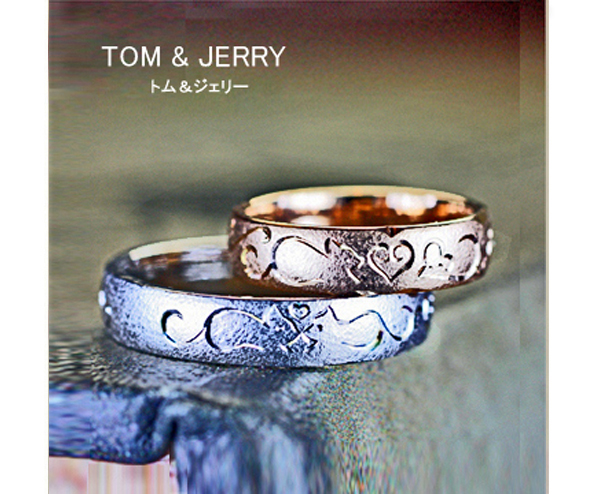 ピンクゴールド＆ホワイトゴールドの結婚指輪にネコの模様がはいっているオーダーリング