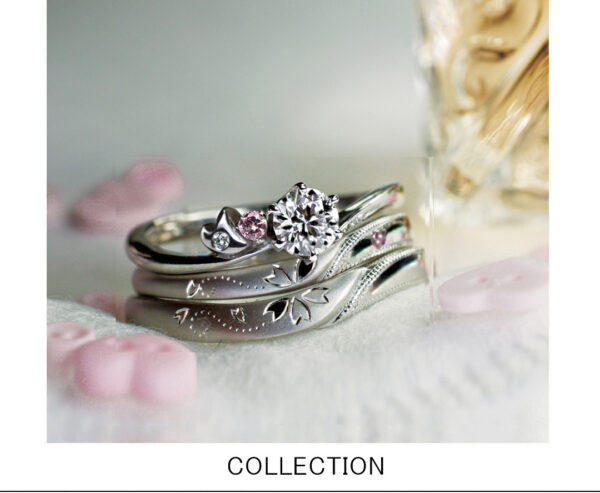 ２本重ねてさくらを作る結婚指輪と桜デザインの婚約指輪３本のセットコレクション ＞