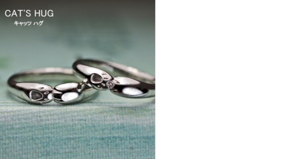 ネコが手でハグするデザインのプラチナ結婚指輪オーダー作品