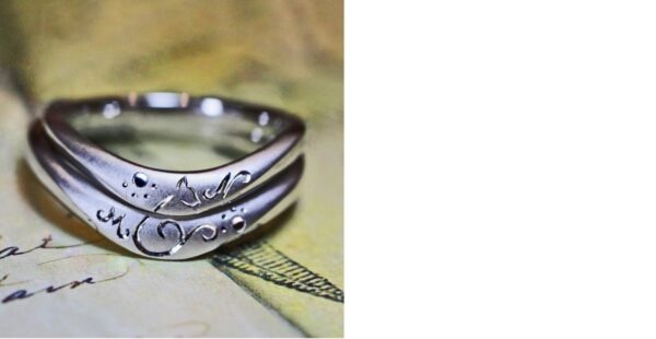 結婚指輪を重ねてネコのイラスト模様とニクキュウをつくるオーダーメイド作品